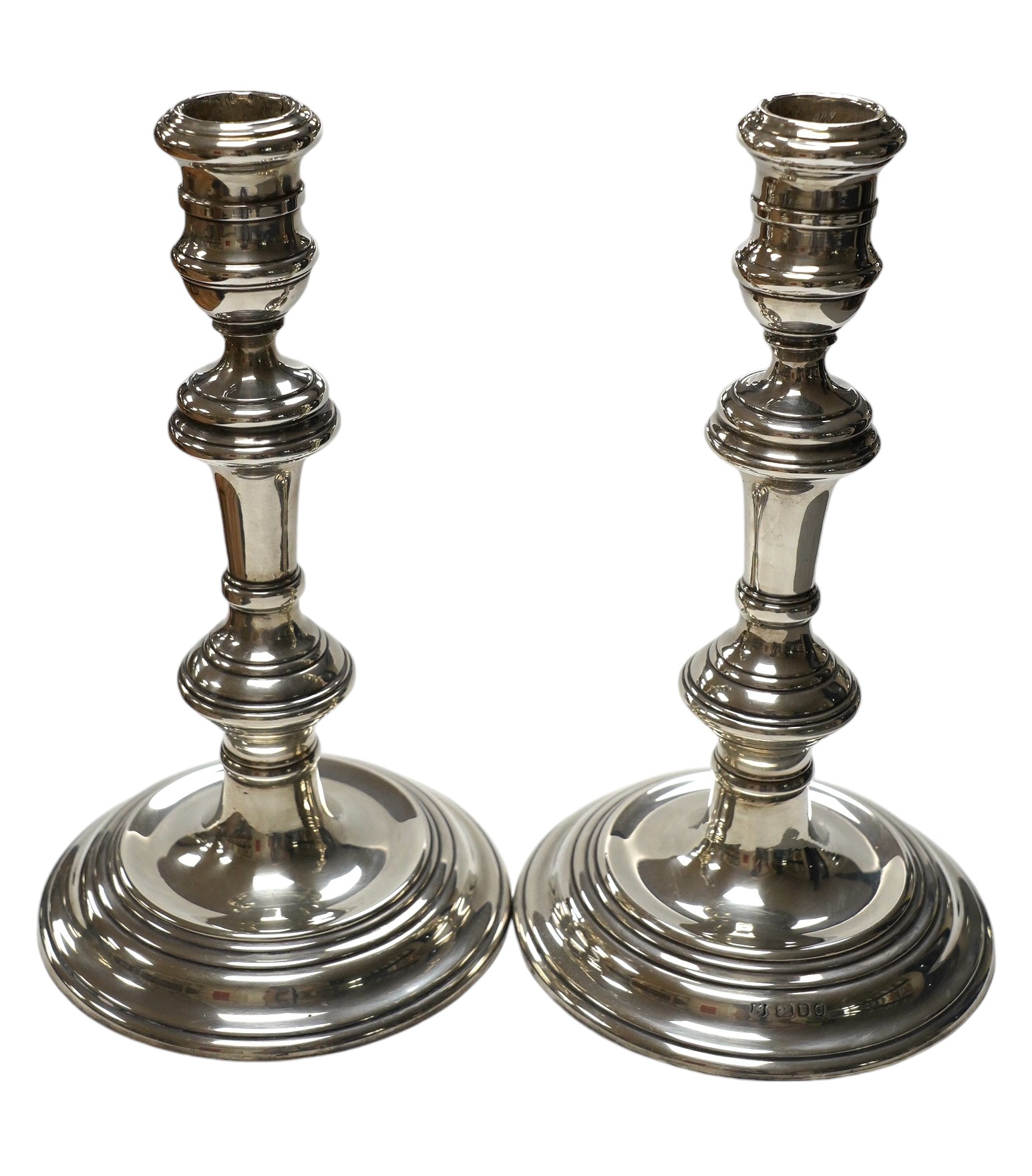 A pair of Elizabeth II silver candlesticks, with turned columns, London, 1958 (maker's marks rubbed, height 20.8cm, weighted. Condition - fair